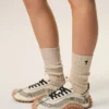 Beige Ami de Coeur-strumpor i bomull