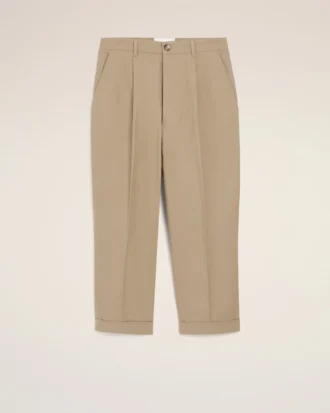 Beige bomullsbyxor i karotmodell med oversized-passform