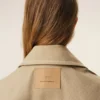 Beige bomullsjacka med knappar Beige bomullsjacka med knappar