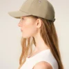 Beige bomullskeps med Ami de Coeur-broderi Beige bomullskeps med Ami de Coeur-broderi