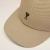 Beige bomullskeps med Ami de Coeur-broderi Beige bomullskeps med Ami de Coeur-broderi
