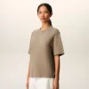 Beige bomullströja med Ami de Coeur-prägling Beige bomullströja med Ami de Coeur-prägling