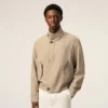 Beige Harrington-jacka i ny ull Beige Harrington-jacka i ny ull