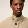 Beige Harrington-jacka i ny ull Beige Harrington-jacka i ny ull