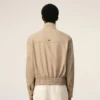 Beige Harrington-jacka i ny ull Beige Harrington-jacka i ny ull