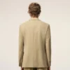 Beige jacka i ny ull med enkelknäppning och rak passform Beige jacka i ny ull med enkelknäppning och rak passform