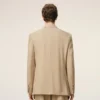 Beige ny ulljacka med dubbla knappar och rak passform
