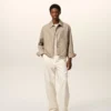 Beige nylonjacka med Ami de Coeur-knappar