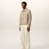 Beige nylonjacka med Ami de Coeur-knappar