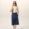 Blå bermuda-shorts i bomull med omlottbälte