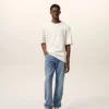 Blå bomullsjeans i klassisk passform Blå bomullsjeans i klassisk passform