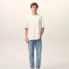Blå bomullsjeans med avsmalnande passform