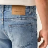 Blå bomullsjeans med avsmalnande passform