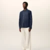 Blå denimskjorta i bomull med Ami de Coeur-motiv Blå denimskjorta i bomull med Ami de Coeur-motiv