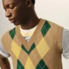 Brun ärmlös tröja i ull och bomull med argyle-intarsia Brun ärmlös tröja i ull och bomull med argyle-intarsia
