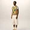 Brun ärmlös tröja i ull och bomull med argyle-intarsia Brun ärmlös tröja i ull och bomull med argyle-intarsia
