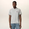 Grå Ami de Coeur Polo-tröja i bomull Grå Ami de Coeur Polo-tröja i bomull