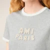 Grå bomullst-shirt med stickad Ami Paris-patch Grå bomullst-shirt med stickad Ami Paris-patch