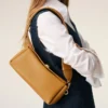 Gul karusellväska i kohud Gul karusellväska i kohud