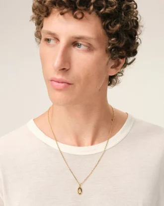 Halsband med hamrat ”0” i guldmässing Halsband med hamrat ”0” i guldmässing
