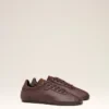 Låga sneakers i slätt vinrött läder