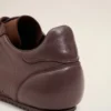 Låga sneakers i slätt vinrött läder