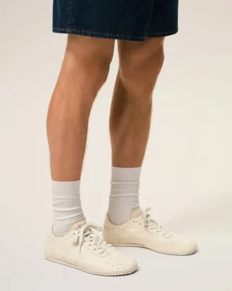 Mjuka sneakers i vitt ko-läder Mjuka sneakers i vitt ko-läder