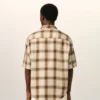 Rät skärpt beige rutig skjorta Ami de Coeur i canvas Rät skärpt beige rutig skjorta Ami de Coeur i canvas