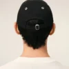 Svart Ami de Coeur Cap i bomull med broderi Svart Ami de Coeur Cap i bomull med broderi