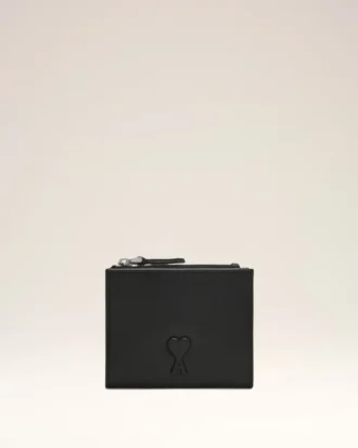 Svart plånbok i veckad design av kohud från Voulez-Vous Svart plånbok i veckad design av kohud från Voulez-Vous