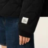 Svart vadderad jacka i nylon Svart vadderad jacka i nylon