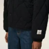 Svart vadderad jacka i nylon Svart vadderad jacka i nylon