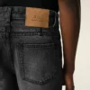 Svarta bomullsjeans med avsmalnande passform Svarta bomullsjeans med avsmalnande passform