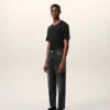 Svarta bomullsjeans med avsmalnande passform Svarta bomullsjeans med avsmalnande passform