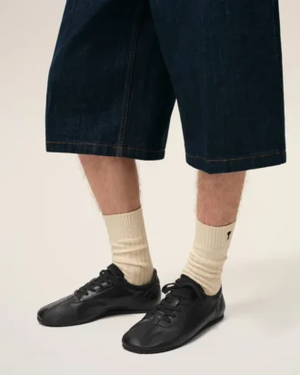 Svarta sneakers i mjukt ko-läder
