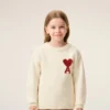 Vit Ami de Coeur Sweater i ull med rund hals Vit Ami de Coeur Sweater i ull med rund hals