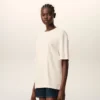 Vit bomullst-shirt med Ami de Coeur-prägling Vit bomullst-shirt med Ami de Coeur-prägling