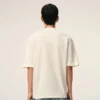 Vit bomullst-shirt med Ami de Coeur-prägling Vit bomullst-shirt med Ami de Coeur-prägling
