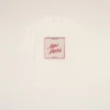 Vit bomullst-shirt med Ami Paris Heritage-tryck