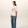 Vit bomullst-shirt med Ami Paris Heritage-tryck
