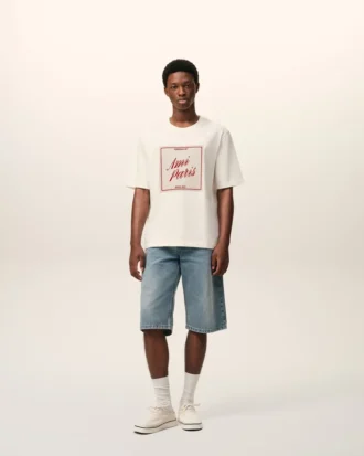 Vit bomullst-shirt med Ami Paris Heritage-tryck
