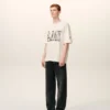Vit bomullst-shirt med Ami Paris-tryck Vit bomullst-shirt med Ami Paris-tryck