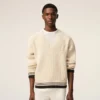 Vit ribbad ulltröja med V-ringning från Ami de Coeur Sweater Vit ribbad ulltröja med V-ringning från Ami de Coeur Sweater