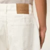 Vita, lösa bermuda-shorts i bomull