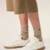 Vita sneakers i koskinn