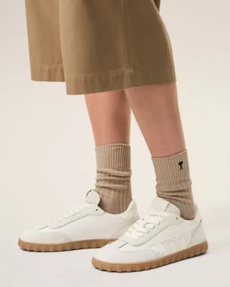 Vita sneakers i koskinn