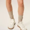 Vita sneakers i koskinn